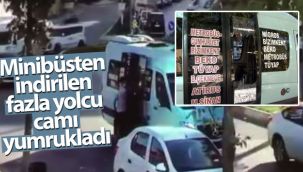 Minibüsten indirilen fazla yolcu yumruklayarak camı kırdı